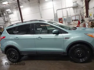 2013 Ford Escape SE with VIN 1FMCU0GX9DUB40739, listed as a IAAI auction lot 41633757 with 87,522 mi miles and . Bid and sale history available at DreamBid. Image 13.