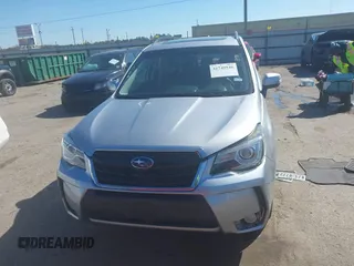 2017 Subaru Forester Touring with VIN JF2SJGTC9HH409665, listed as a IAAI auction lot 41749546 with 118,635 mi miles. Bid and sale history available at carsss.com. Image 12.