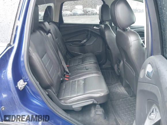 2014 Ford Escape Titanium with VIN 1FMCU9J99EUA46103, listed as a IAAI auction lot 42018097 with 169,878 mi miles and . Bid and sale history available at DreamBid. Image 8.