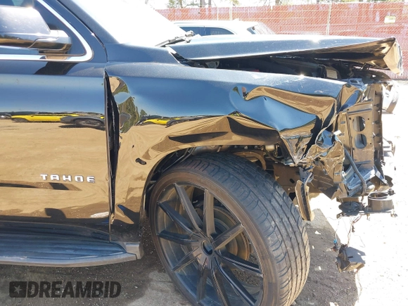 2020 Chevrolet Tahoe LT with VIN 1GNSKBKC7LR159742, listed as a IAAI auction lot 41854694 with 112,087 mi miles and . Bid and sale history available at DreamBid. Image 18.