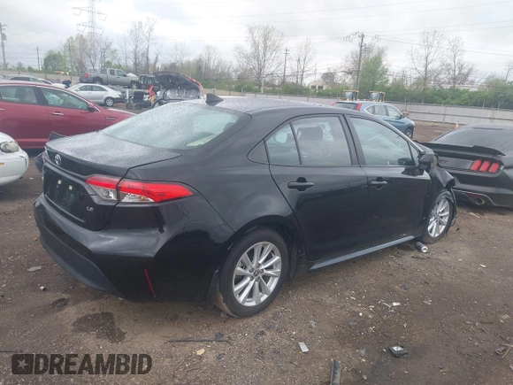2023 Toyota Corolla LE with VIN 5YFB4MDE1PP058774, listed as a IAAI auction lot 42068978 with 19,802 mi miles and . Bid and sale history available at DreamBid. Image 4.