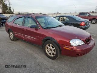 2001 Mercury Sable LS Premium with VIN 1MEHM59S91A635138, listed as a Copart auction lot 84674814 with 170,559 mi miles and Salvage Title. Bid and sale history available at DreamBid. Image 4.