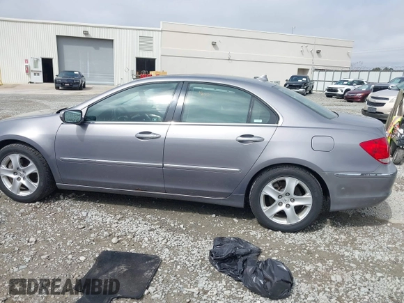 2005 Acura RL z VIN JH4KB16525C006978, wystawiony jako IAAI lot #41800979 z przebiegiem 213 501 mil mil oraz . Historia ofert i sprzedaży dostępna na DreamBid. Obrazek 14.