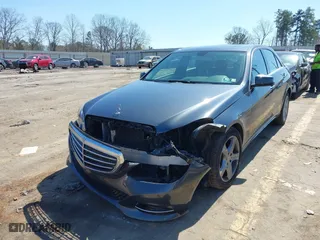 2014 Mercedes-Benz E-Class E 350 Luxury with VIN WDDHF8JB8EA865368, listed as a IAAI auction lot 41790012 with 98,788 mi miles. Bid and sale history available at carsss.com. Image 2.