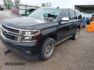 2016 Chevrolet Tahoe LTZ with VIN 1GNSKCKC7GR171904, listed as a IAAI auction lot 41967060 with 223,334 mi miles and . Bid and sale history available at DreamBid. Image 2.