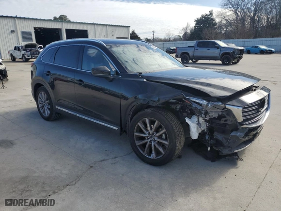 2021 Mazda CX-9 Grand Touring with VIN JM3TCBDY9M0512353, listed as a Copart auction lot 48182435 with 83,242 mi miles and Salvage Title. Bid and sale history available at carsss.com. Image 4.
