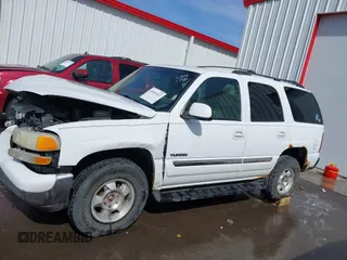 2003 GMC Yukon SLT with VIN 1GKEK13V23J300767, listed as a IAAI auction lot 41691632 with 251,849 mi miles. Bid and sale history available at carsss.com. Image 14.