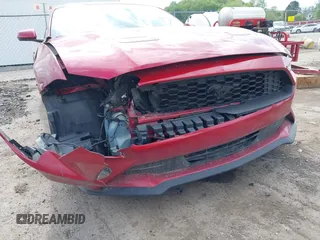 2020 Ford Mustang EcoBoost z VIN 1FA6P8TH6L5149788, wystawiony jako IAAI lot #42179624 z przebiegiem 107 520 mil mil oraz . Historia ofert i sprzedaży dostępna na DreamBid. Obrazek 6.