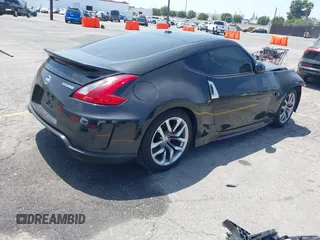 2015 Nissan 370Z Sport with VIN JN1AZ4EH3FM441836, listed as a IAAI auction lot 42094959 with 59,004 mi miles and . Bid and sale history available at DreamBid. Image 4.