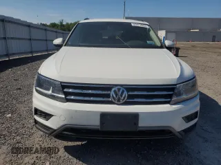 2021 Volkswagen Tiguan S with VIN 3VV1B7AX5MM031994, listed as a Copart auction lot 55471875 with 105,268 mi miles and Clean Title. Bid and sale history available at DreamBid. Image 5.