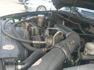 1999 Chevrolet Blazer LT z VIN 1GNCS13W1X2169673, wystawiony jako IAAI lot #42778174 z przebiegiem 127 038 mil mil oraz . Historia ofert i sprzedaży dostępna na DreamBid. Obrazek 18.