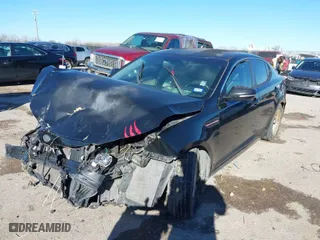 2011 Kia Optima LX with VIN KNAGM4A7XB5133681, listed as a IAAI auction lot 41602973 with 210,615 mi miles. Bid and sale history available at carsss.com. Image 2.