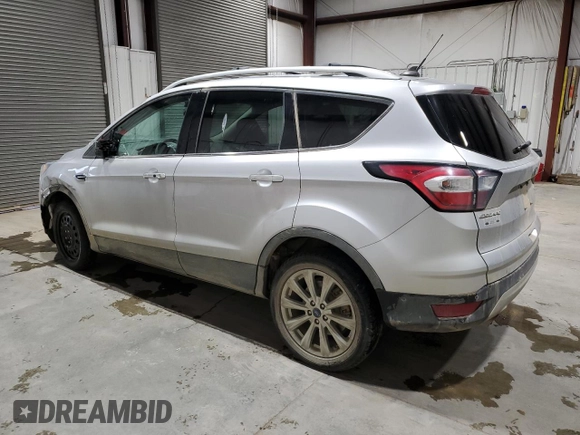 2018 Ford Escape Titanium with VIN 1FMCU9J95JUC62170, listed as a Copart auction lot 86991454 with 93,486 mi miles and Salvage title. Bid and sale history available at DreamBid. Image 2.