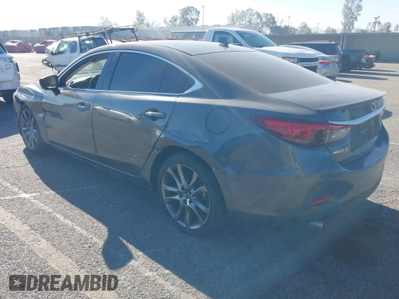 2017 Mazda 6 Grand Touring with VIN JM1GL1W51H1137470, listed as a IAAI auction lot 41872756 with 132,564 mi miles. Bid and sale history available at carsss.com. Image 3.