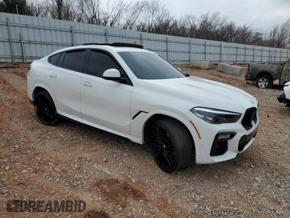 2021 BMW X6 sDrive40i z VIN 5UXCY4C03M9H36510, wystawiony jako Copart lot #86419524 z przebiegiem Nie podano mil oraz Szkody całkowita. Historia ofert i sprzedaży dostępna na DreamBid. Obrazek 4.
