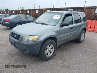 2005 Ford Escape XLT with VIN 1FMYU93165KA02357, listed as a IAAI auction lot 42858975 with 119,905 mi miles and . Bid and sale history available at DreamBid. Image 12.