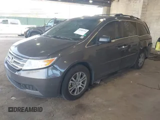 2012 Honda Odyssey EX-L with VIN 5FNRL5H67CB016934, listed as a IAAI auction lot 42405714 with 248,512 mi miles and . Bid and sale history available at DreamBid. Image 17.