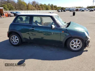 2004 MINI Hardtop with VIN WMWRC33484TJ58571, listed as a Copart auction lot 74843094 with Not Provided miles and Salvage Title. Bid and sale history available at DreamBid. Image 4.