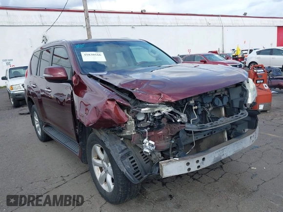 2011 Lexus GX 460 with VIN JTJBM7FXXB5022326, listed as a IAAI auction lot 41830166 with 180,976 mi miles. Bid and sale history available at carsss.com. Image 1.