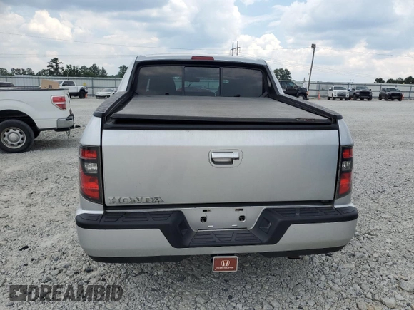 2013 Honda Ridgeline Sport with VIN 5FPYK1F77DB009641, listed as a Copart auction lot 63378875 with 115,828 mi miles and Salvage title. Bid and sale history available at DreamBid. Image 6.