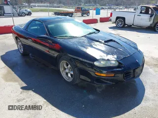 2000 Chevrolet Camaro Z28 z VIN 2G1FP22G6Y2173715, wystawiony jako IAAI lot #41821151 z przebiegiem 263 727 mil mil oraz . Historia ofert i sprzedaży dostępna na DreamBid. Obrazek 1.