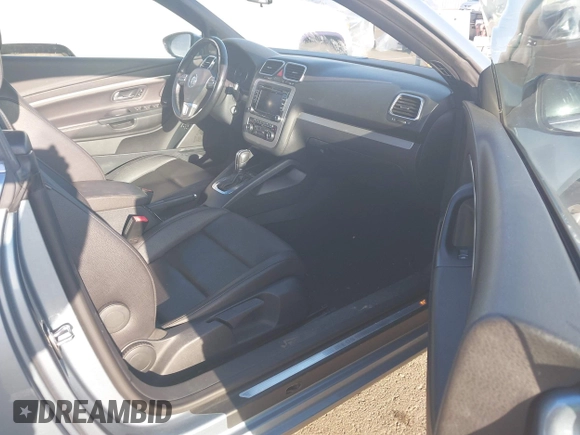 2012 Volkswagen Eos Komfort with VIN WVWBW7AH1CV022066, listed as a IAAI auction lot 41950391 with 98,877 mi miles and . Bid and sale history available at DreamBid. Image 5.