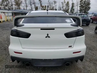 2010 Mitsubishi Lancer Evolution SE with VIN JA32W6FV3AU034052, listed as a Copart auction lot 72463644 with 44,517 mi miles and Salvage Title. Bid and sale history available at carsss.com. Image 6.