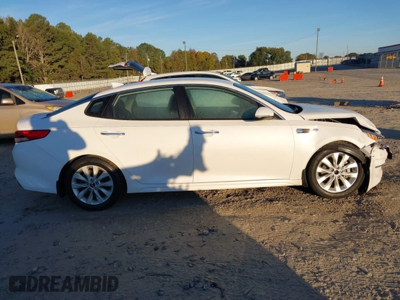 2018 Kia Optima LX with VIN 5XXGT4L32JG265716, listed as a IAAI auction lot 40645411 with 112,305 mi miles and . Bid and sale history available at DreamBid. Image 13.
