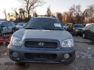 2003 Hyundai Santa Fe GLS with VIN KM8SC73D73U518784, listed as a IAAI auction lot 41348907 with 127,980 mi miles. Bid and sale history available at carsss.com. Image 6.