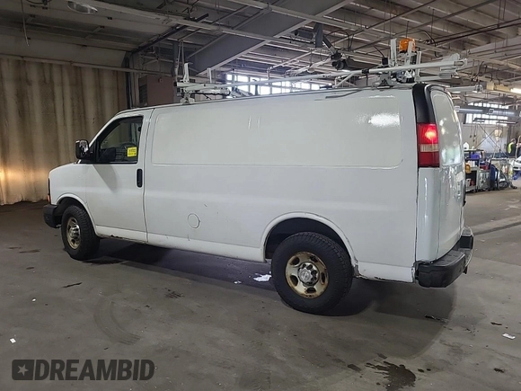 2015 Chevrolet Express Cargo with VIN 1GCWGFCF2F1163079, listed as a IAAI auction lot 42832363 with 183,774 mi miles and . Bid and sale history available at DreamBid. Image 34.