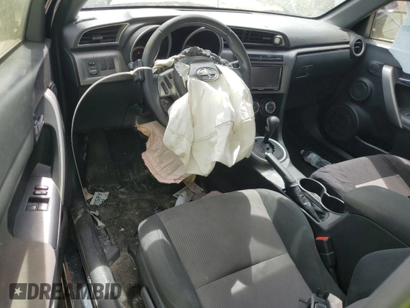 2016 Scion tC z VIN JTKJF5C75GJ013834, wystawiony jako Copart lot #53867955 z przebiegiem 245 467 mil mil oraz Szkody całkowita. Historia ofert i sprzedaży dostępna na DreamBid. Obrazek 8.
