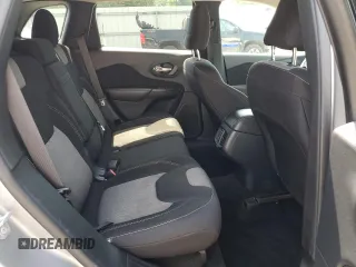 2015 Jeep Cherokee Sport z VIN 1C4PJLAB4FW707010, wystawiony jako Copart lot #57338145 z przebiegiem 112 720 mil mil oraz Czysty tytuł • Clean title. Historia ofert i sprzedaży dostępna na DreamBid. Obrazek 11.