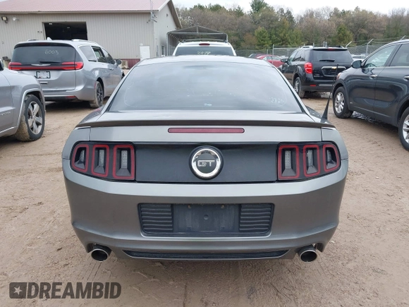 2013 Ford Mustang GT with VIN 1ZVBP8CF1D5261761, listed as a IAAI auction lot 42173607 with 76,658 mi miles and . Bid and sale history available at DreamBid. Image 16.