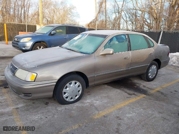 1999 Toyota Avalon XL with VIN 4T1BF18B7XU338562, listed as a IAAI auction lot 41439217 with NaN miles. Bid and sale history available at carsss.com. Image 2.