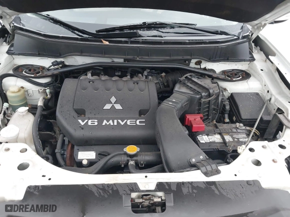 2010 Mitsubishi Outlander GT with VIN JA4JT5AXXAZ016007, listed as a IAAI auction lot 41595345 with 207,985 mi miles. Bid and sale history available at carsss.com. Image 10.