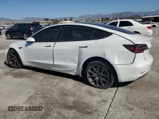 2021 Tesla Model 3 Standard Range Plus with VIN 5YJ3E1EA8MF874156, listed as a Copart auction lot 46323505 with Not Provided miles and Salvage Title. Bid and sale history available at DreamBid. Image 2.