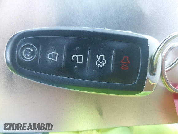 2015 Ford Escape Titanium with VIN 1FMCU0J92FUA20469, listed as a IAAI auction lot 42510293 with 161,466 mi miles and . Bid and sale history available at DreamBid. Image 11.