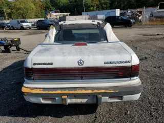 1992 Chrysler LeBaron z VIN 1C3XU553XNF239048, wystawiony jako Copart lot #69465714 z przebiegiem Nie podano mil oraz Tytuł czysty. Historia ofert i sprzedaży dostępna na DreamBid. Obrazek 6.