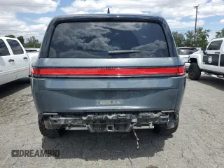 2022 Rivian R1S Launch Edition z VIN 7PDSGABL5NN001018, wystawiony jako Copart lot #56914725 z przebiegiem 26 156 mil mil oraz Szkoda całkowita • Salvage title. Historia ofert i sprzedaży dostępna na DreamBid. Obrazek 6.