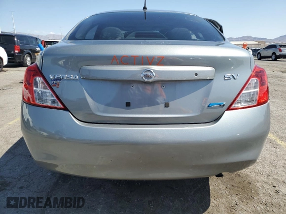 2012 Nissan Versa SV with VIN 3N1CN7AP0CL946595, listed as a Copart auction lot 59562915 with 107,228 mi miles and Salvage title. Bid and sale history available at DreamBid. Image 6.