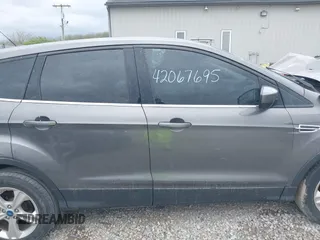 2013 Ford Escape SE with VIN 1FMCU0GX3DUC84979, listed as a IAAI auction lot 42067695 with 162,447 mi miles and . Bid and sale history available at DreamBid. Image 13.