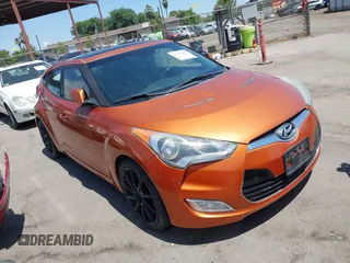 2012 Hyundai Veloster w/Black Int with VIN KMHTC6AD4CU049722, listed as a IAAI auction lot 42594609 with 72,324 mi miles and . Bid and sale history available at DreamBid. Image 1.