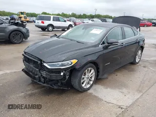 2019 Ford Fusion Hybrid SEL with VIN 3FA6P0MU1KR202860, listed as a IAAI auction lot 41983299 with 133,671 mi miles. Bid and sale history available at carsss.com. Image 18.