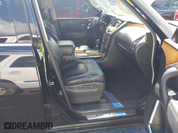 2012 Infiniti QX56 7-passenger z VIN JN8AZ2NEXC9017449, wystawiony jako IAAI lot #42349105 z przebiegiem 244 048 mil mil oraz . Historia ofert i sprzedaży dostępna na DreamBid. Obrazek 5.