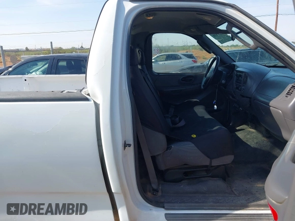 2004 Ford F-150 XL with VIN 2FTRF17WX4CA74272, listed as a IAAI auction lot 42657638 with 119,928 mi miles and . Bid and sale history available at DreamBid. Image 5.