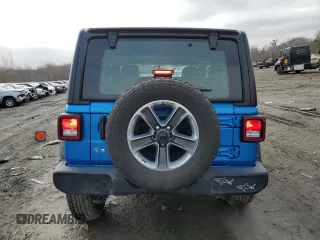 2021 Jeep Wrangler Sport S with VIN 1C4GJXAG2MW762104, listed as a Copart auction lot 46620845 with 56,799 mi miles and Salvage Title. Bid and sale history available at DreamBid. Image 6.