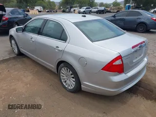 2010 Ford Fusion Hybrid с VIN 3FADP0L38AR296069, выставлен на аукционе IAAI как лот 42760565 с пробегом 94 994 миль миль и . История ставок и продаж доступна на DreamBid. Изображение 3.