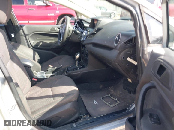 2018 Ford Fiesta SE with VIN 3FADP4BJ4JM134833, listed as a IAAI auction lot 41924079 with 76,781 mi miles and . Bid and sale history available at DreamBid. Image 5.