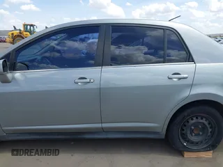 2009 Nissan Versa 1.8 S with VIN 3N1BC11E39L381507, listed as a IAAI auction lot 41956643 with 120,730 mi miles. Bid and sale history available at carsss.com. Image 15.