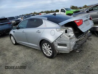 2015 Kia Optima EX with VIN 5XXGN4A75FG505073, listed as a Copart auction lot 50218595 with 77,199 mi miles and Salvage Title. Bid and sale history available at carsss.com. Image 2.
